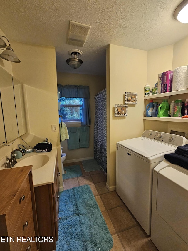 199 Pear Tree Way, Del Rio, TN 37727 - laundry area featuring independent washer and dryer, tile patterned flooring, and a textured ceiling