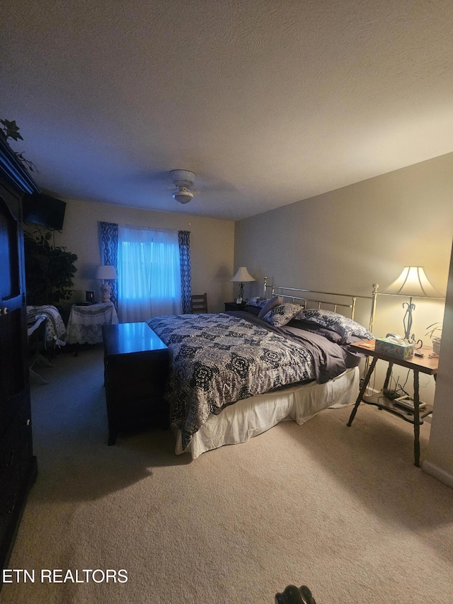 199 Pear Tree Way, Del Rio, TN 37727 - bedroom with carpet flooring, a textured ceiling, and a ceiling fan