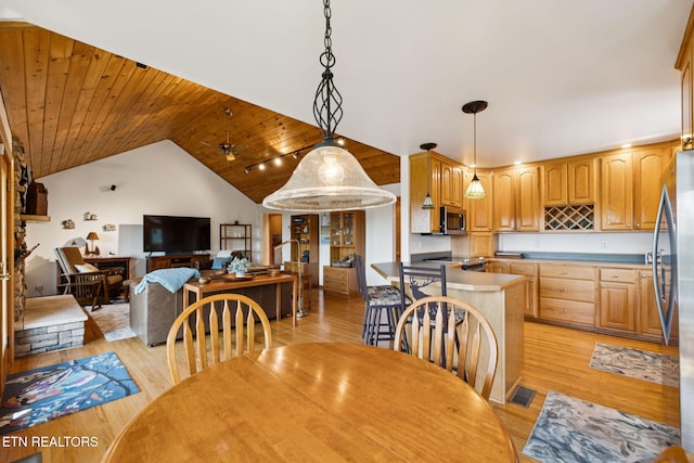 3930 Settlers Trl, Kodak, TN 37764 - dining area featuring vaulted ceiling, wood ceiling, and light wood-style floors