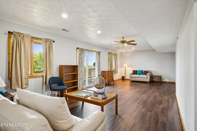 3930 Settlers Trl, Kodak, TN 37764 - living room featuring dark wood-style flooring, recessed lighting, ceiling fan, and a textured ceiling