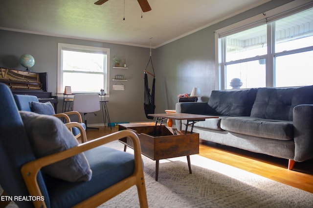 1210 Frank Campbell Rd, Jamestown, TN 38556 - living area with wood finished floors, ornamental molding, and a ceiling fan