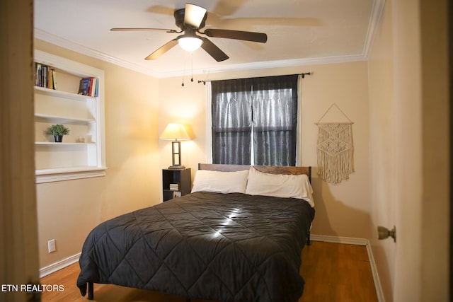 1210 Frank Campbell Rd, Jamestown, TN 38556 - bedroom featuring wood finished floors, a ceiling fan, and ornamental molding