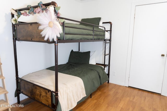 1210 Frank Campbell Rd, Jamestown, TN 38556 - bedroom featuring wood finished floors and baseboards