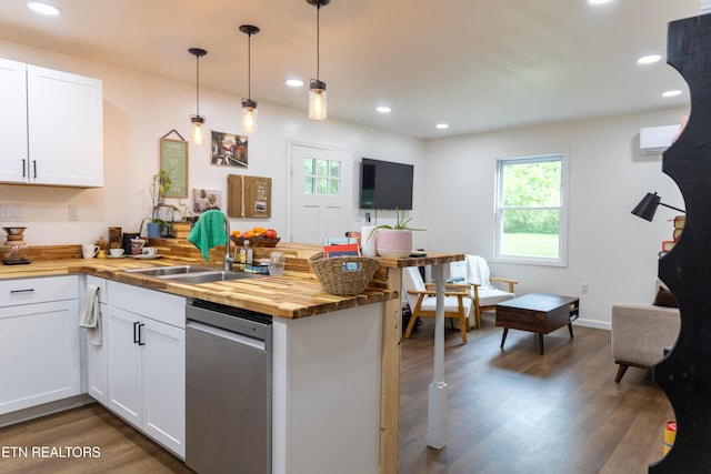 1210 Frank Campbell Rd, Jamestown, TN 38556 - kitchen with dishwasher, wood counters, a peninsula, dark wood-style floors, and white cabinets