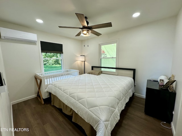 1210 Frank Campbell Rd, Jamestown, TN 38556 - bedroom with a wall unit AC, wood finished floors, recessed lighting, and a ceiling fan