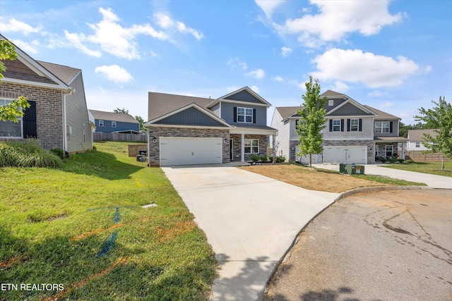 10630 Lady May Ln, Knoxville, TN 37931 - craftsman inspired home with driveway, stone siding, and a garage