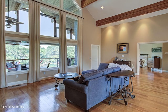 230 Tecumseh Way, Loudon, TN 37774 - living area with high vaulted ceiling, beamed ceiling, and light wood finished floors