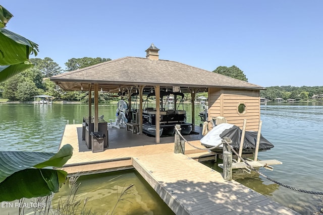 230 Tecumseh Way, Loudon, TN 37774 - dock with boat lift and a water view