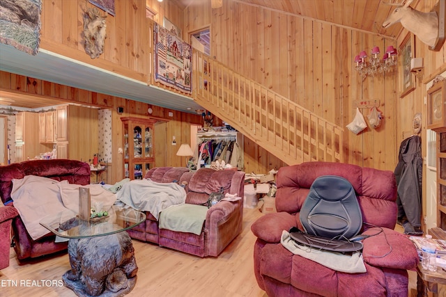 3255 Bear Mountain Ln, Sevierville, TN 37876 - living room with wood walls, wood finished floors, and a high ceiling
