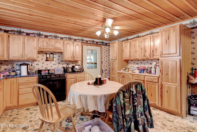 3255 Bear Mountain Ln, Sevierville, TN 37876 - dining room featuring wallpapered walls, wooden ceiling, ceiling fan, and light stone finish flooring