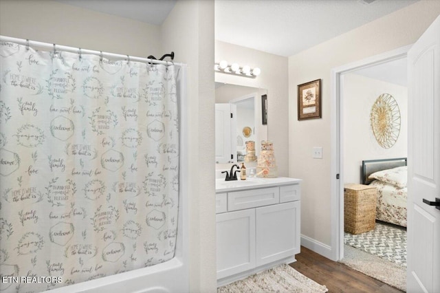 226 Hilldale Ln, Lafollette, TN 37766 - ensuite bathroom with vanity, wood finished floors, and shower / bathtub combination with curtain
