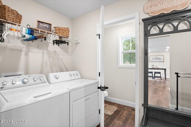 226 Hilldale Ln, Lafollette, TN 37766 - washroom with washing machine and clothes dryer and dark wood finished floors