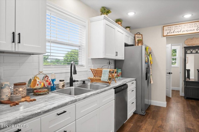 226 Hilldale Ln, Lafollette, TN 37766 - kitchen with appliances with stainless steel finishes, white cabinetry, plenty of natural light, light countertops, and recessed lighting