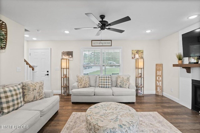226 Hilldale Ln, Lafollette, TN 37766 - living room featuring wood finished floors, a fireplace, ceiling fan, recessed lighting, and stairs