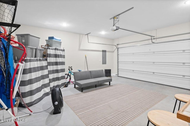 226 Hilldale Ln, Lafollette, TN 37766 - garage with electric panel, a garage door opener, and recessed lighting