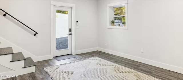 3402 Lillie Blvd, Sevierville, TN 37876 - foyer with healthy amount of natural light, wood finished floors, and stairway