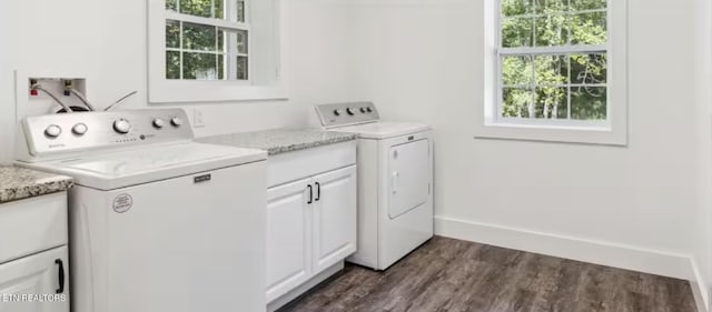 3402 Lillie Blvd, Sevierville, TN 37876 - laundry area featuring washing machine and clothes dryer, cabinet space, and dark wood-style floors