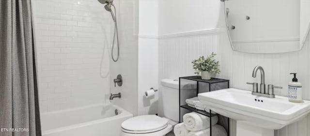3402 Lillie Blvd, Sevierville, TN 37876 - bathroom featuring shower / bath combo and wainscoting