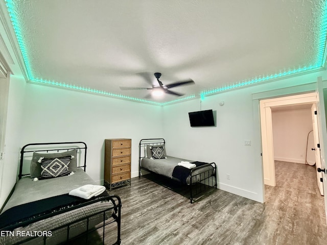 3402 Lillie Blvd, Sevierville, TN 37876 - bedroom with wood finished floors and ceiling fan