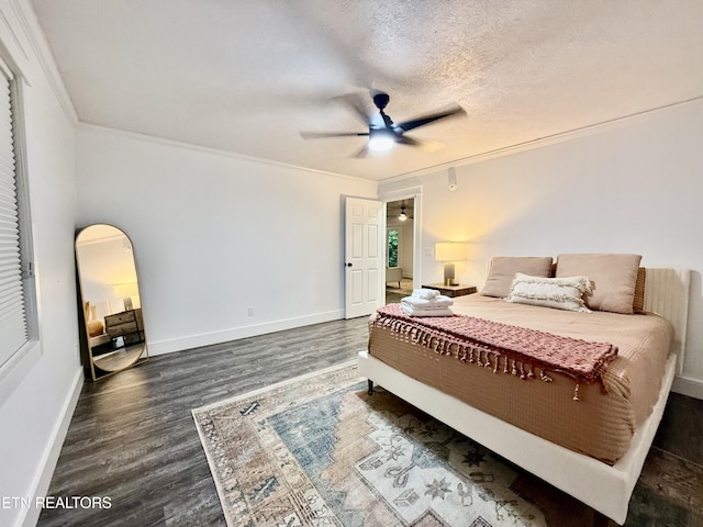 3402 Lillie Blvd, Sevierville, TN 37876 - bedroom featuring wood finished floors, crown molding, ceiling fan, and a textured ceiling