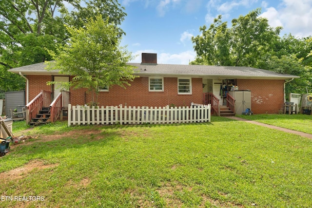 1415 Ebenezer Rd, Knoxville, TN 37922 - ranch-style home featuring a shed, brick siding, a chimney, and entry steps