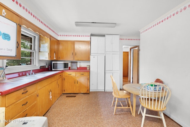 1415 Ebenezer Rd, Knoxville, TN 37922 - kitchen featuring stainless steel microwave and light floors