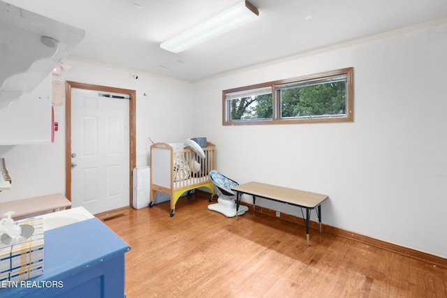 1415 Ebenezer Rd, Knoxville, TN 37922 - living area with light wood-style floors and ornamental molding