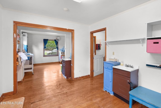 1415 Ebenezer Rd, Knoxville, TN 37922 - hallway with light wood finished floors and crown molding