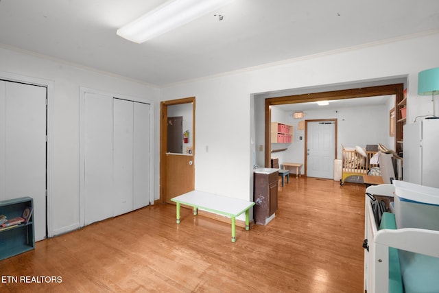 1415 Ebenezer Rd, Knoxville, TN 37922 - hallway with ornamental molding and light wood-type flooring