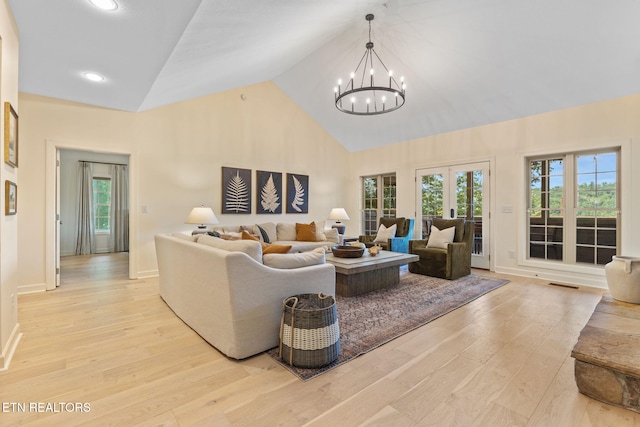 200 Stony Rock Ln, Jacksboro, TN 37757 - living area with light wood-style flooring, a chandelier, plenty of natural light, high vaulted ceiling, and recessed lighting