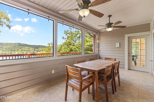 200 Stony Rock Ln, Jacksboro, TN 37757 - sunroom with ceiling fan, plenty of natural light, and outdoor dining area
