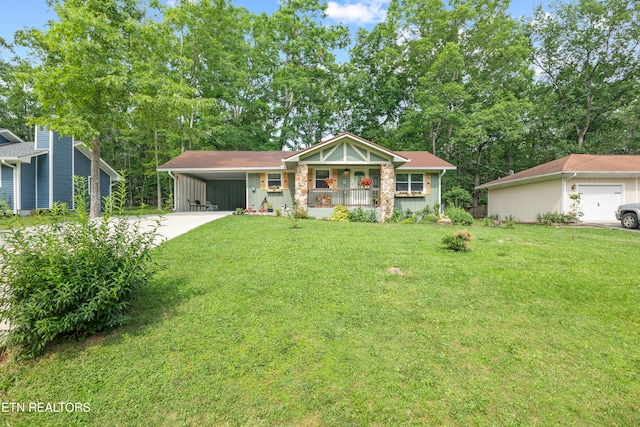 137 Jasper Dr, Crossville, TN 38558 - view of front of property featuring concrete driveway, a front yard, and covered porch