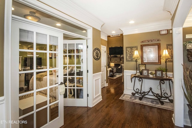 8507 Cloudbreak Ln Unit 4, Knoxville, TN 37938 - hallway featuring crown molding, wood finished floors, wainscoting, french doors, and a decorative wall