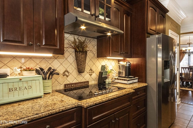 8507 Cloudbreak Ln Unit 4, Knoxville, TN 37938 - kitchen featuring stainless steel refrigerator with ice dispenser, black electric stovetop, under cabinet range hood, light stone countertops, and tasteful backsplash