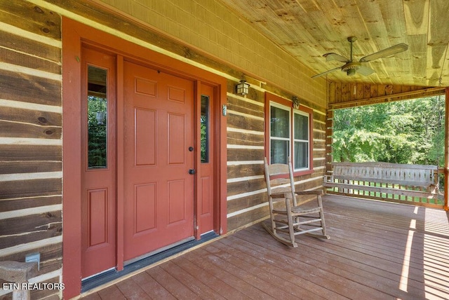 1821 S Nopone Valley Rd, Decatur, TN 37322 - doorway to property featuring a porch, ceiling fan, and log siding