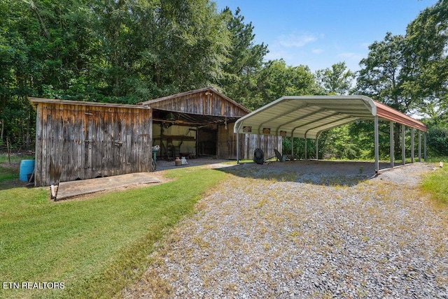 1821 S Nopone Valley Rd, Decatur, TN 37322 - view of parking / parking lot featuring a detached carport and driveway