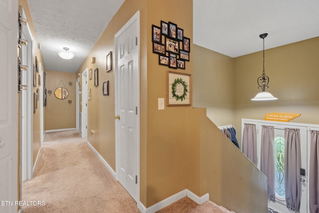 1717 Meadow Ridge Cir, Sevierville, TN 37862 - corridor featuring carpet flooring and a textured ceiling