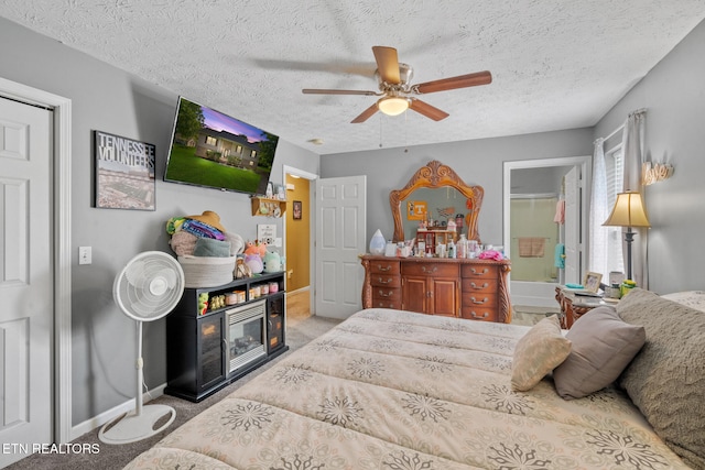 1717 Meadow Ridge Cir, Sevierville, TN 37862 - bedroom featuring a textured ceiling, carpet floors, and a ceiling fan