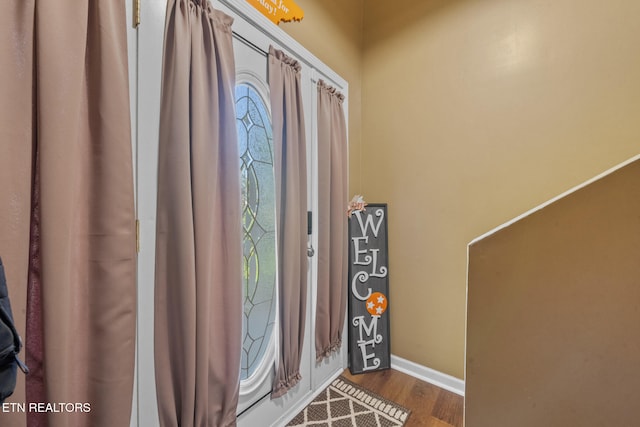 1717 Meadow Ridge Cir, Sevierville, TN 37862 - foyer entrance with dark wood-style flooring and baseboards