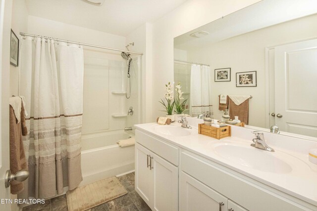 7408 Game Bird St, Corryton, TN 37721 - full bathroom featuring double vanity and shower / tub combo with curtain