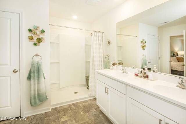 7408 Game Bird St, Corryton, TN 37721 - full bathroom featuring connected bathroom, double vanity, and curtained shower