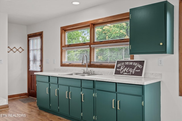 2931 E Emory Rd, Knoxville, TN 37938 - kitchen featuring light countertops, green cabinetry, light wood finished floors, and recessed lighting