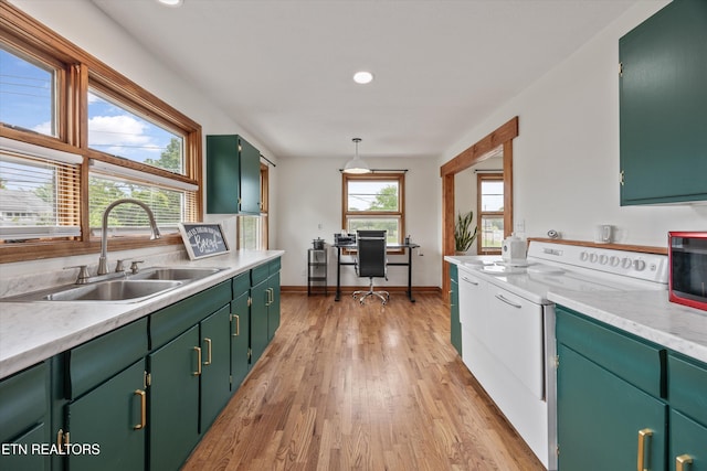 2931 E Emory Rd, Knoxville, TN 37938 - kitchen featuring white range with electric stovetop, light wood-type flooring, light countertops, green cabinets, and recessed lighting