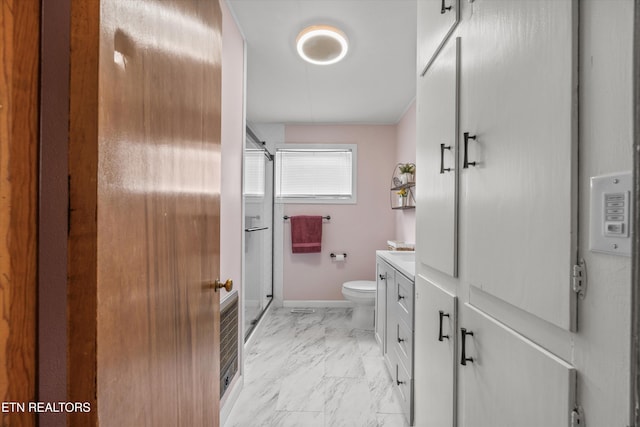 2931 E Emory Rd, Knoxville, TN 37938 - full bath with marble look tiles, a shower stall, and vanity