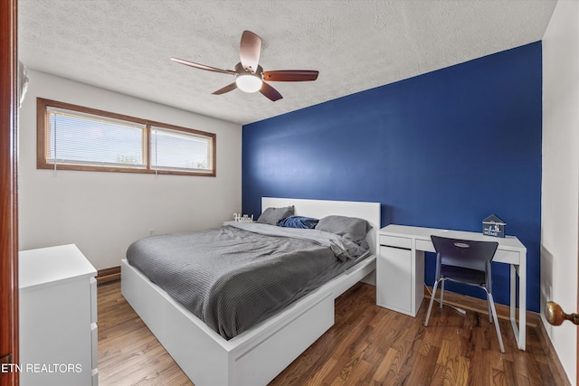 2931 E Emory Rd, Knoxville, TN 37938 - bedroom with a textured ceiling, wood finished floors, and a ceiling fan