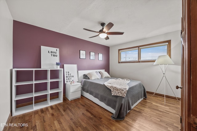2931 E Emory Rd, Knoxville, TN 37938 - bedroom featuring wood finished floors and a ceiling fan