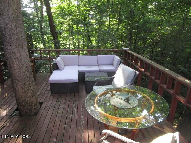 262 Mountain View Dr, Rutledge, TN 37861 - wooden deck featuring outdoor lounge area and a view of trees