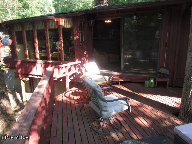 262 Mountain View Dr, Rutledge, TN 37861 - wooden deck with a sunroom