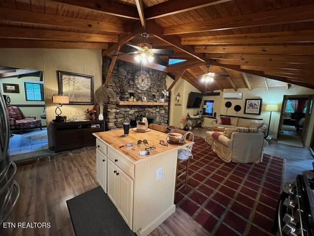 262 Mountain View Dr, Rutledge, TN 37861 - kitchen featuring a ceiling fan, wood ceiling, dark wood-style floors, white cabinetry, and open floor plan