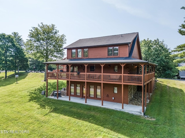 2028 Piney Overlook Ln, Sevierville, TN 37862 - rear view of property with a patio area, a yard, and a wooden deck
